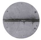Photograph of the First Positron Ever Identified. Its Track is Bent Due to the Existence of a Magnetic Field