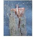 A wedge splits a log by changing the distance th force acts upon. Image by Wikimedia Commons/Andy Dingley