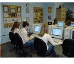 800px-Students working on class assignment in computer lab
