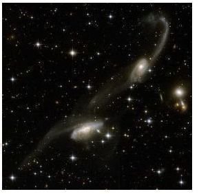 Two Galaxies Distorted by an Ongoing Interaction (ESO 69-6, ESO 069-IG006, AM 1633-682)
