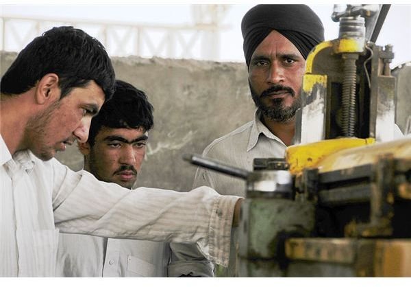 800px-Factory workers in Herat