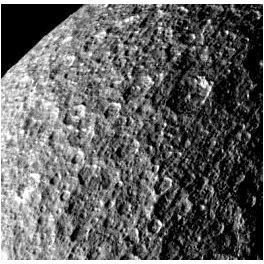 Rhea Is Mainly Composed Of Water-Ice - Image Courtesy NASA-JPL