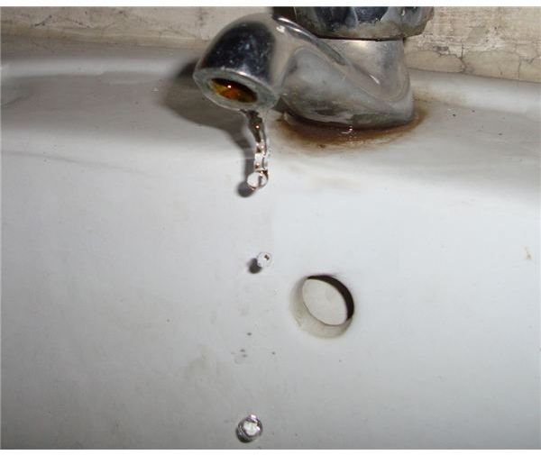 Water Dripping form a Tap