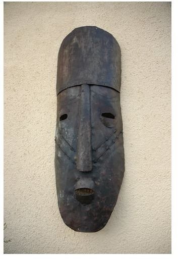 Learn How to Make an African Mask From Paper Mache