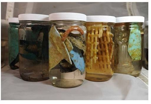 Jars of debris taken back for analysis in land-based laboratories.