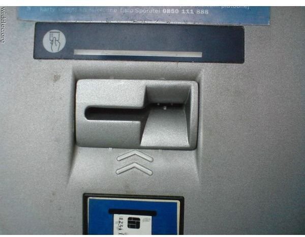 ATM Skimming Device. Notice the arrow is too near