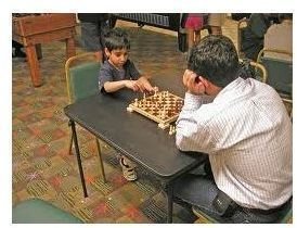 Playing chess is fun for young and old