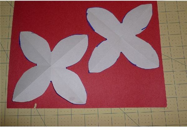 place the templates on the construction paper