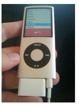 iPod Nano, with Nike Plus Receiver plugged in 