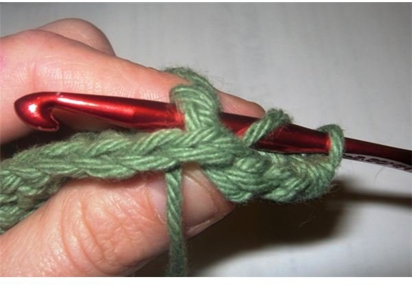 Making a Back Post Double Crochet (BPDC) stitch.