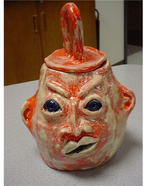 Use Coil Building with Clay to Make Coil Face Jugs in High School Art