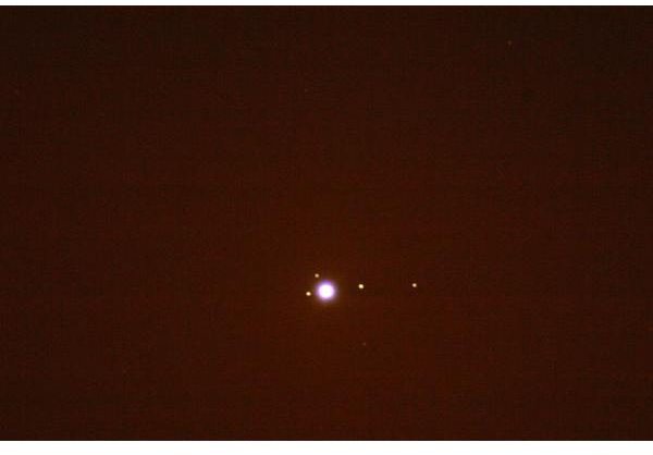 Jupiter and its four largest moons