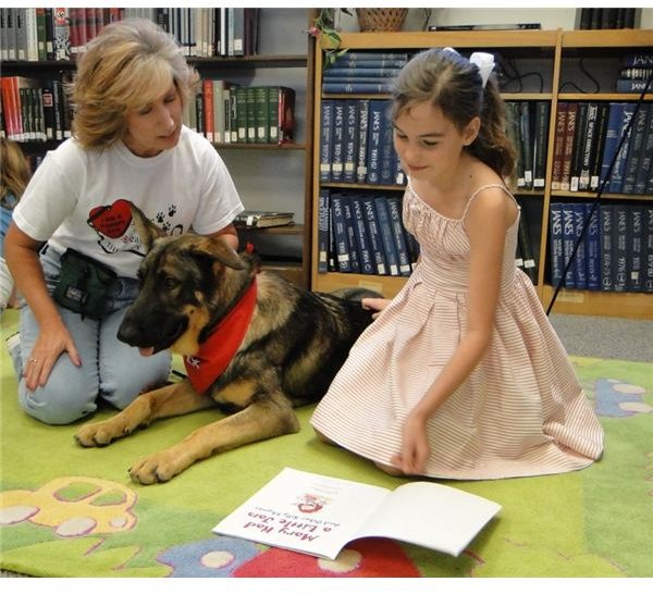 Reading to Dogs Programs: Reading Assistance Dogs Help Struggling Readers