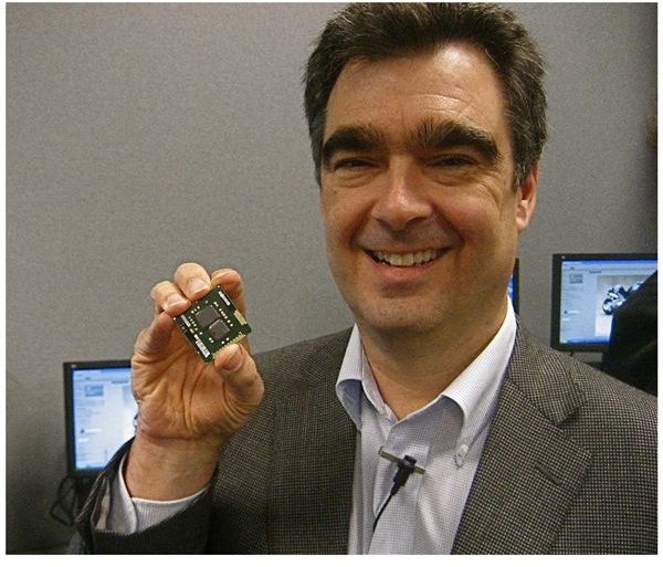 Steve Smith Holds a 32nm Westmere CPU