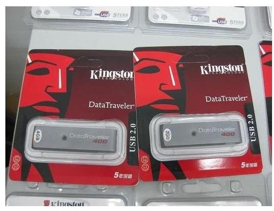 faked Kingston drives with stickers to show size.  Note cheap plastic packaging with push seals