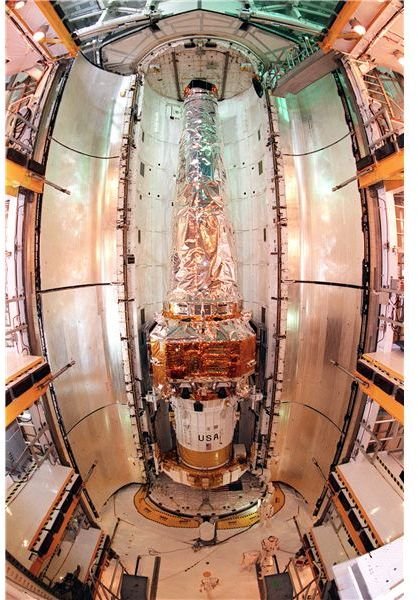 Chandra, pre-launch within Columbia. Credit: NASA.