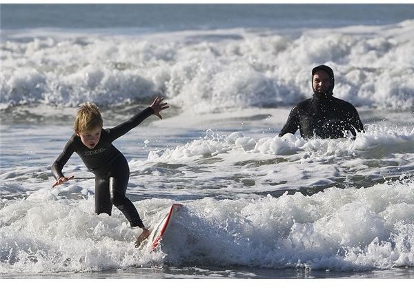 Father and son surf lesson in Morro Bay, CA