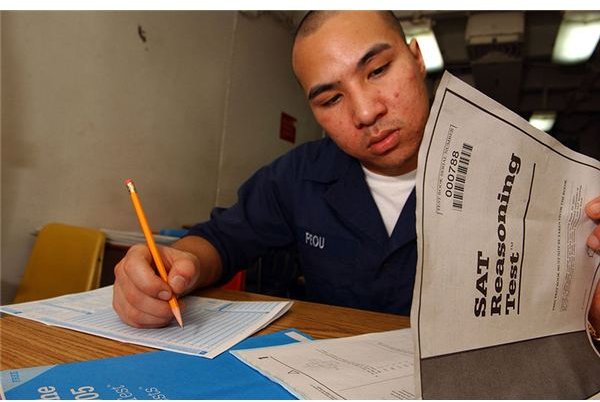 800px-US Navy 050223-N-5821P-054 Seaman Chanthorn Peou of San Diego, Calif., takes his Scholastic Aptitude Test (SAT) aboard the conventionally powered aircraft carrier USS Kitty Hawk (CV 63)