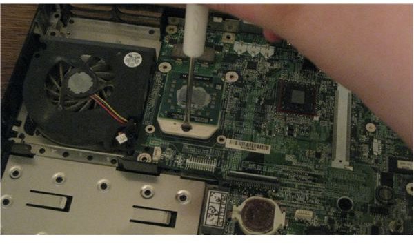 How to Install a Dell Laptop Motherboard - Removing the CPU, PC Card