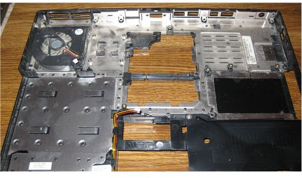 How to Install a Dell Laptop Motherboard - Removing the CPU, PC Card