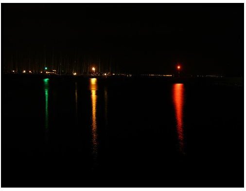 lighted buoys at night