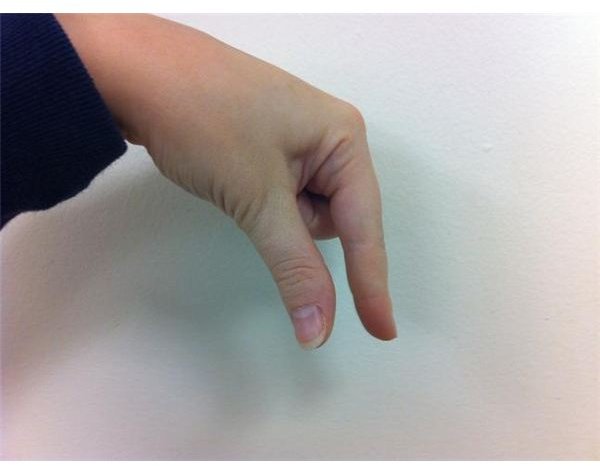 American Sign Language: Fingerspelling Q