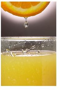 Glass of freshly squeezed orange juice uid 1180107