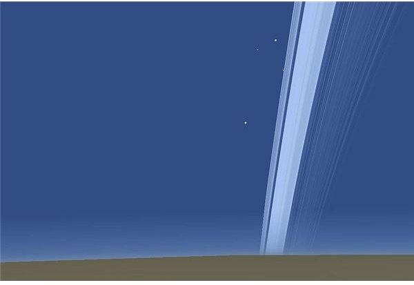 A Simulation of Saturn Rings as Seen from a Position High in the Atmosphere of the Planet. Four Moons are Also Visible: Titan, Dione, Prometheus and Pallene