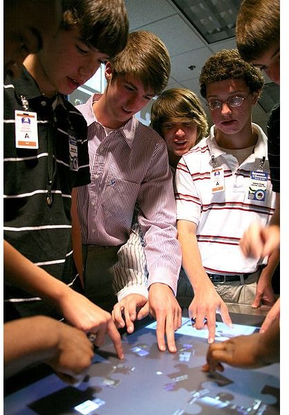 400px-US Army 52288 Trey McMeans (second from the left) from Clements High School tests the Virtual Sandbox table-top display with fellow classmates