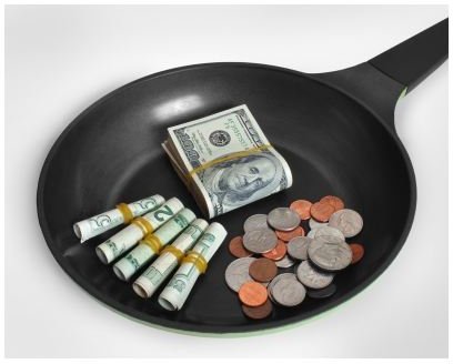 FreeDigitalPhotos, money in a pan, Boaz Yiftach