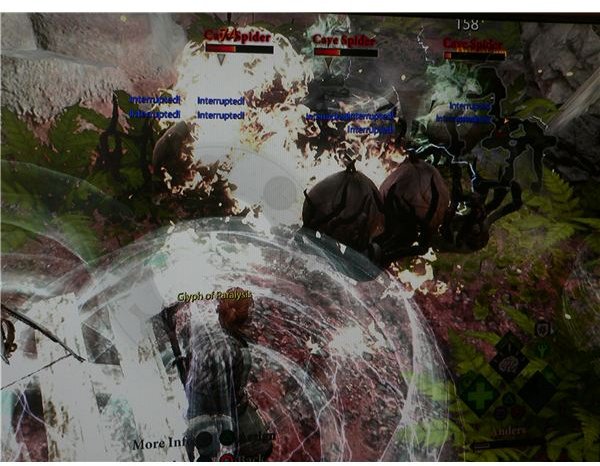 Mage guide for Dragon Age 2: Two spiders are paralysed by Ander’s Glyph of Paralysis spell.
