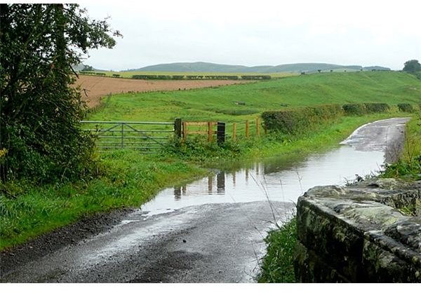 Flooded lane near Powburn - geograph.org.uk - 1507894