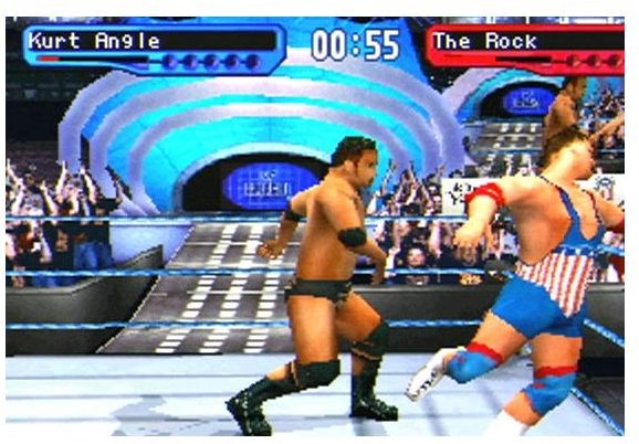 The Rock lays the SmackDown on Kurt Angle.