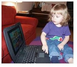 toddler on laptop