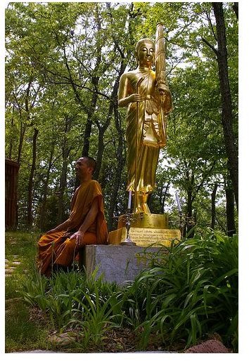 Monk and Buddha Statue