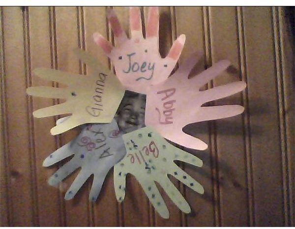 Preschool Crafts on Friendship: Handprint Wreath, Hand Chain, and